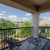 balcony with views of landscaping